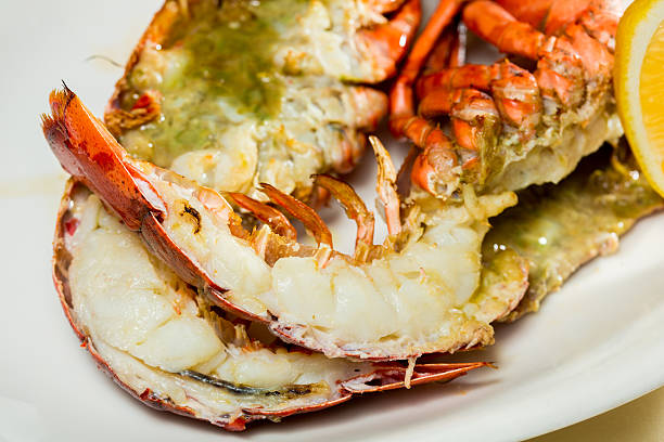 istock organic lobster on dish with lemon slices 486896631