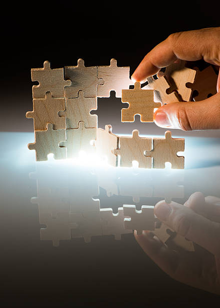 istock Wooden puzzle and backlight background. Close up 486898341
