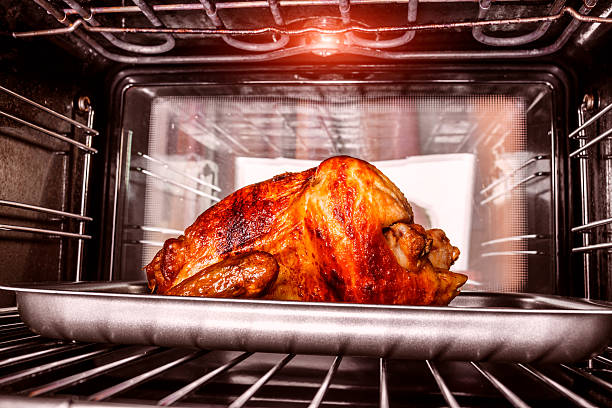 istock Roast chicken in the oven. 486899464