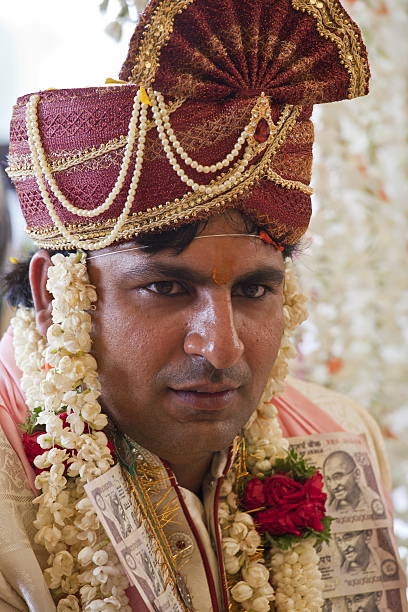 istock Happy handsome indian groom at his wedding. 486901448