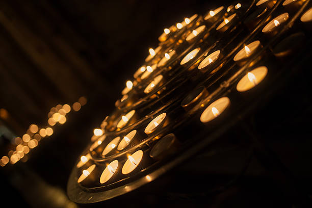 istock Praying candles in a temple 486904272