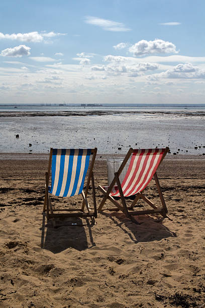 istock Deckchairs on Three Shells Beach, Southend-on-Sea, Essex, Englan 486905514