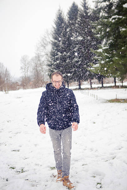 istock Young man winter outdoors portrait 486906630