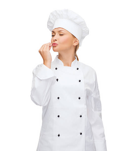 istock smiling female chef showing delicious sign 486909948