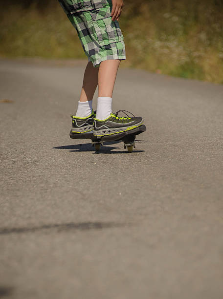 istock Legs in sneakers on a 