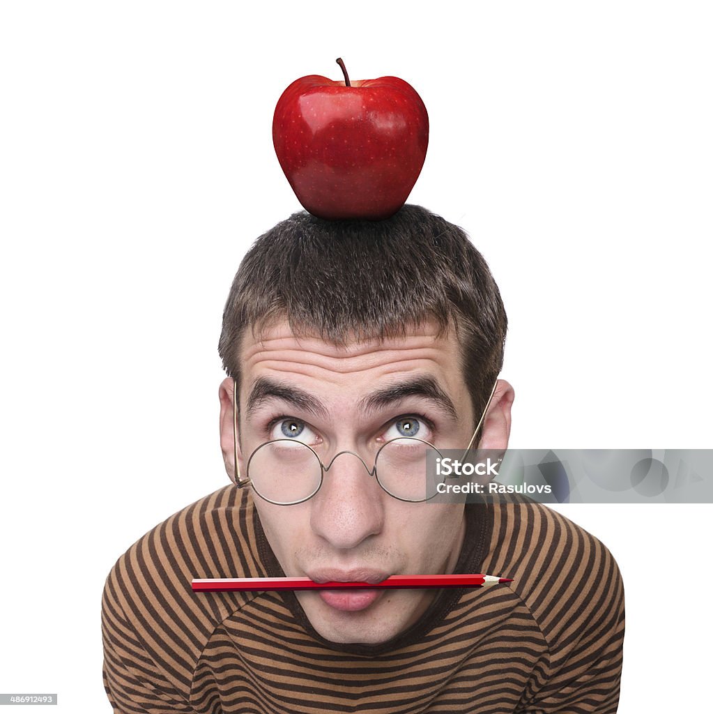 Food For Thought On the boy's head is an apple. Creative. Adult Stock Photo