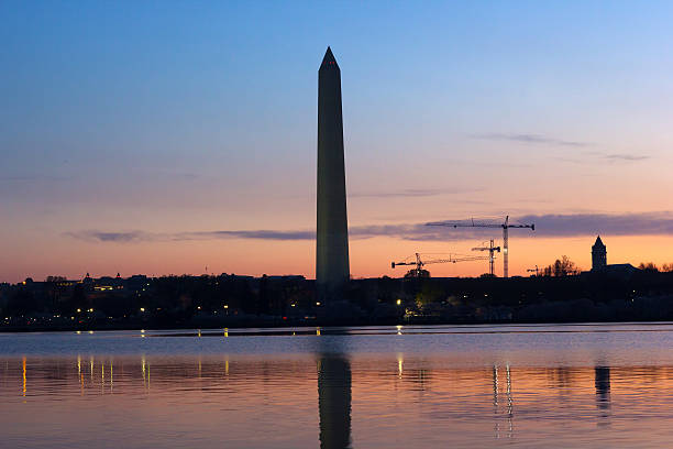 istock Washington Monument at dawn with city skyline on background. 486913153
