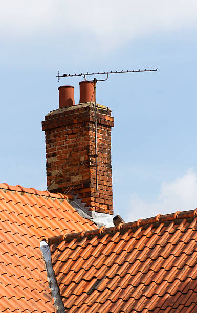 istock Tv aerial on old chimney 486913997