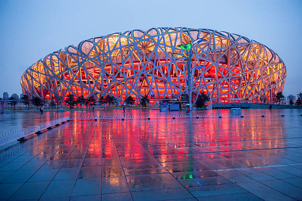 Beijing National Stadium Beijing,China - April 01 , 2011 : Bird's Nest is a Beijing National Stadium at night in Beijing, China. The stadium was established for the 2008 Summer Olympics and Paralympics. beijing olympic stadium photos stock pictures, royalty-free photos & images