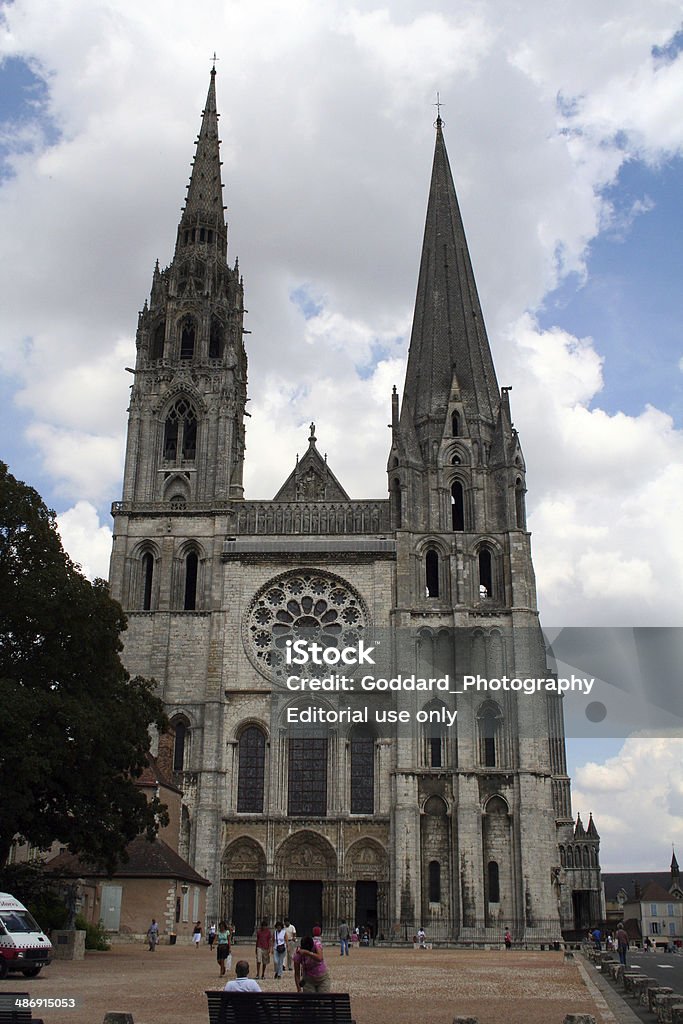 France: Chartres Cathedral Chartres, France - July 29, 2006: The Chartres Cathedral was constructed between 1194 and 1250, and is now a UNESCO World Heritage Site and one of France's biggest tourist attractions. It is noted for its spectacular stained glass windows. Cathedral Stock Photo