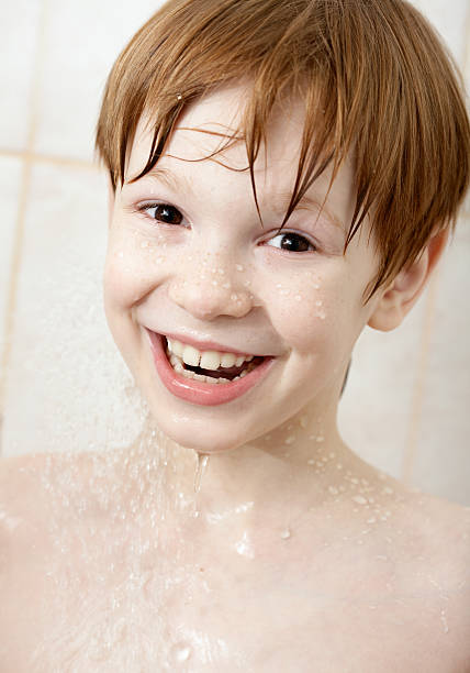 istock Boy in sprays of water 486915707