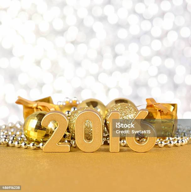 2016 Year Golden Figures And Christmas Decorations Stock Photo - Download Image Now - 2015, 2016, Abstract
