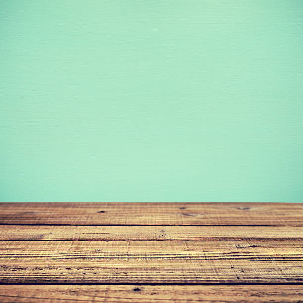 istock Old wooden table and wall in retro style 486916570
