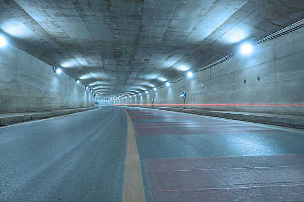 istock car moving in Tunnel 486919473