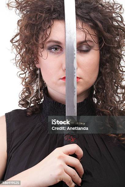 Piercing Woman Curly Girl And Sword Stock Photo - Download Image Now - Abstract, Adult, Adults Only