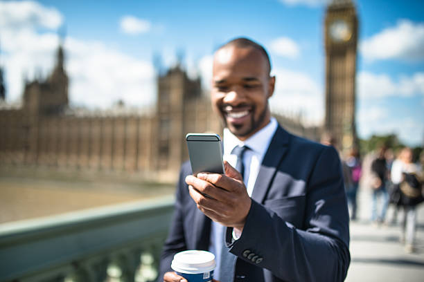 istock Business man on the phone in london 486920924