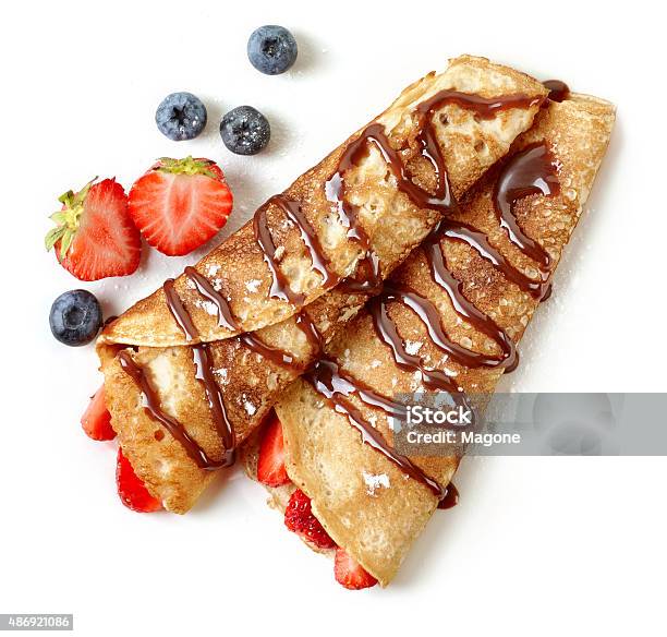 Crepes With Strawberries And Chocolate Stock Photo - Download Image Now - Crêpe - Pancake, Pancake, White Background
