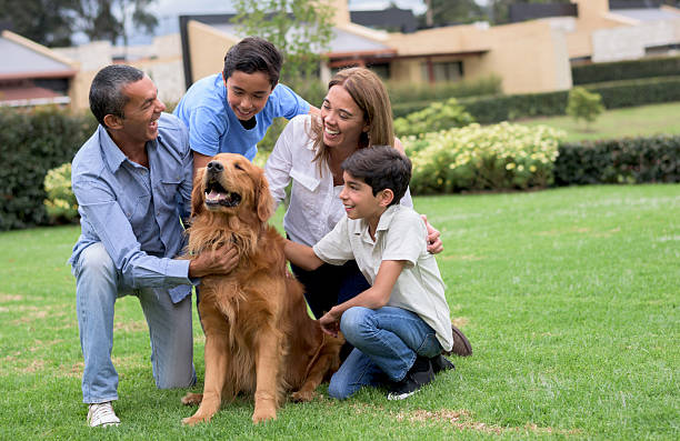 istock Beautiful family with a dog 486921804
