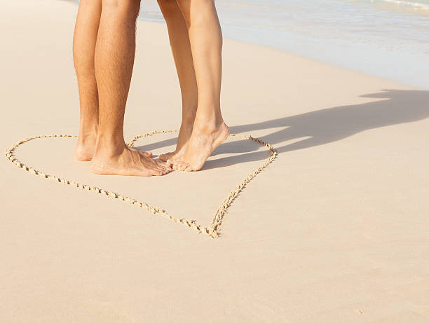 istock Couple kissing on the beach. 486923288