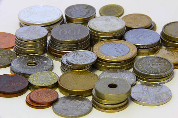 istock Coins of multiple currencies - Stacked 486925002