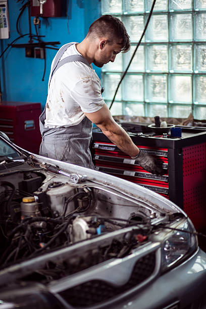 istock Automobile repair shop worker 486925064