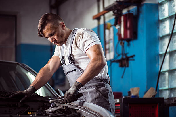 istock Uniformed mechanic in service station 486926048