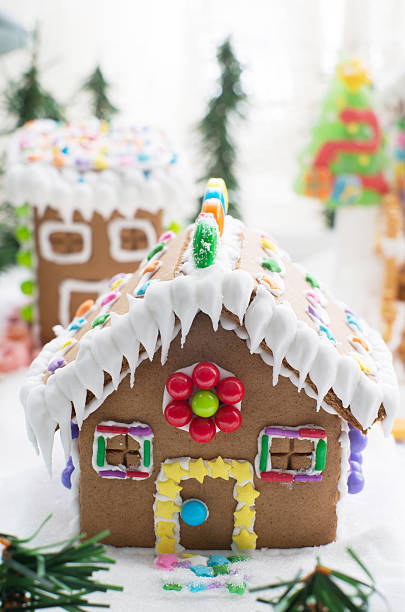 istock Gingerbread house in snow 486927458