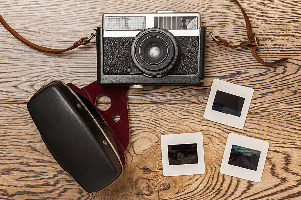istock Old film camera and slides 486928810