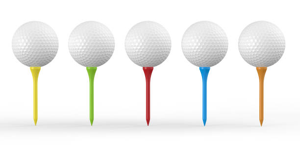 balle de golf sur tee-shirt coloré - dimple golf ball golf ball photos et images de collection