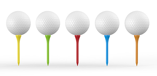 Golf Balls On Colored Tees Isolated On White Background