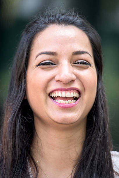 istock Hispanic Young Woman laughing 486932466