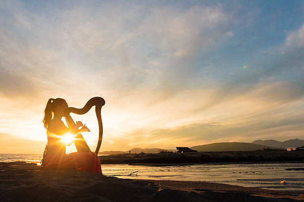 istock Harpist with lens flare 486932694