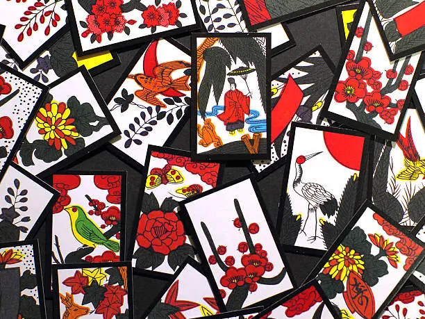 Japanese card game. The player makes a combination of the cards and collects the points.