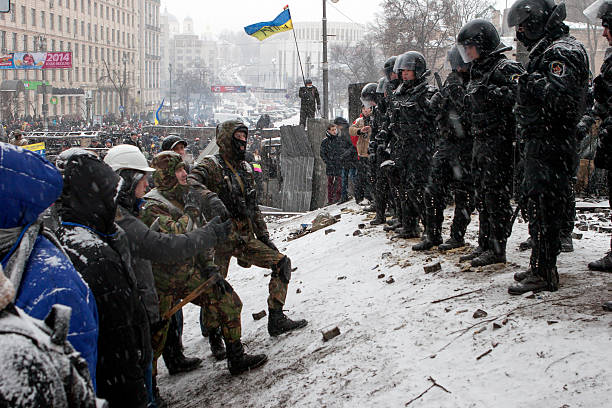 Kiev, Ukraine Kiev, Ukraine - 21 January, 2014: Protest against "Dictatorship" in Ukraine turns violent on Euromaidan in Kiev. Against the president Yanukovych on 21 January, 2014 in Kiev, Maidan, Ukraine 2014 stock pictures, royalty-free photos & images