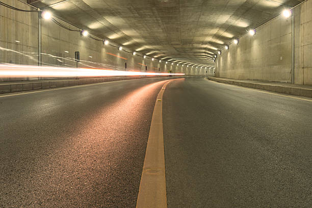 istock car moving in Tunnel 486934611