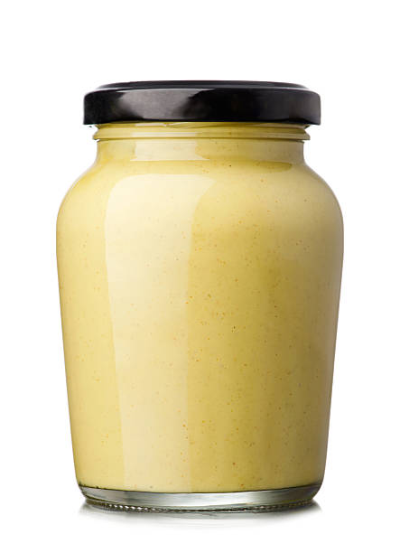 Mustard Glass jar of mustard isolated on the white background mustard photos stock pictures, royalty-free photos & images