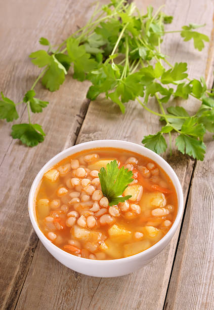 istock Bean soup on wooden table 486934891