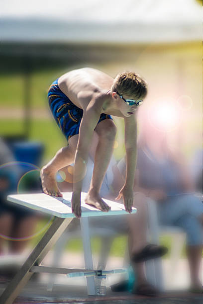 istock Boy about to start a swimming race 486936532