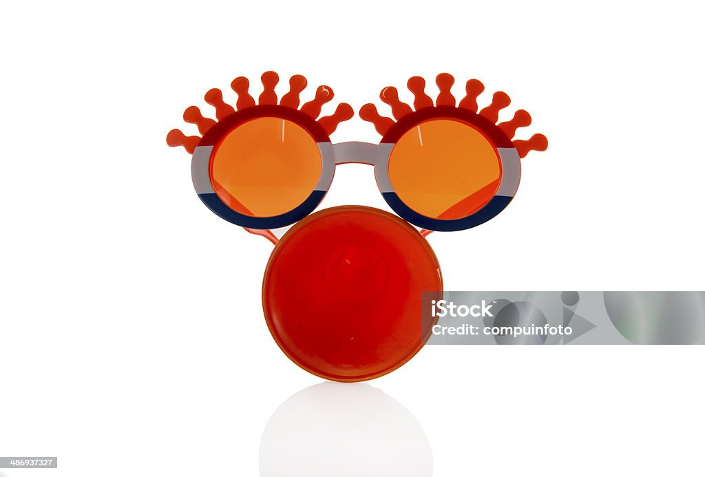 orange glasses and horn plastic glasses in orange color and horn isolated on white Art Stock Photo