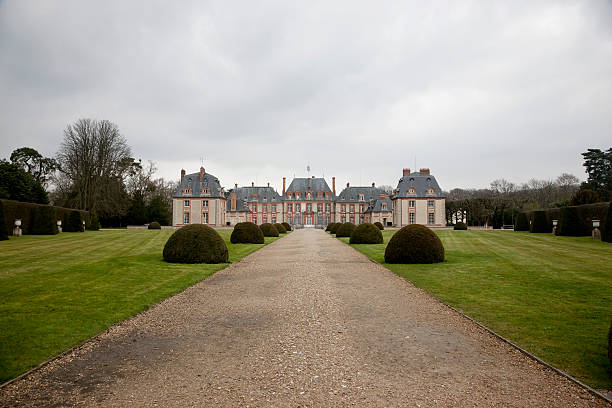 The Chateau de Breteuil in rainy day stock photo