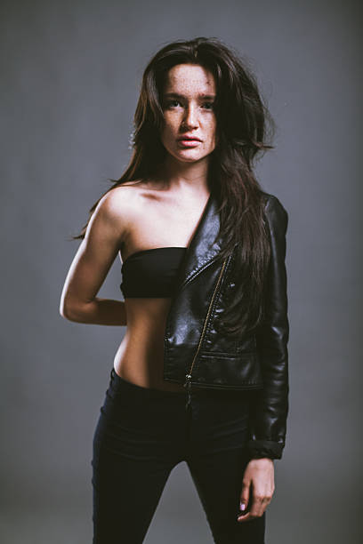 istock freckles and rock girl 486950320