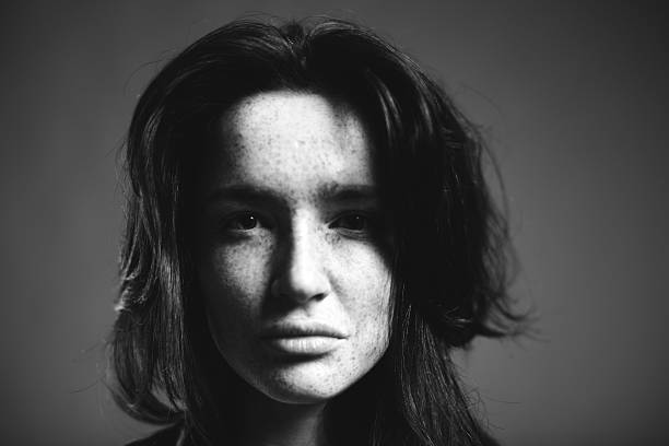istock freckles and rock girl 486950450