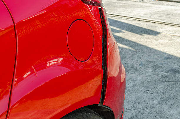 istock Red car damage at rear skirt 486951836