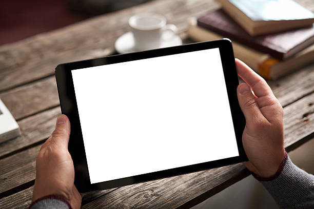 istock Man shows screen of tablet in his hands 486953672