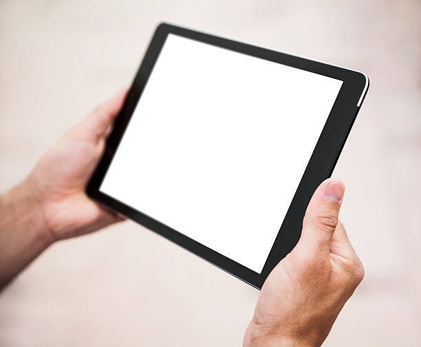 istock Man shows screen of tablet in his hands 486953840