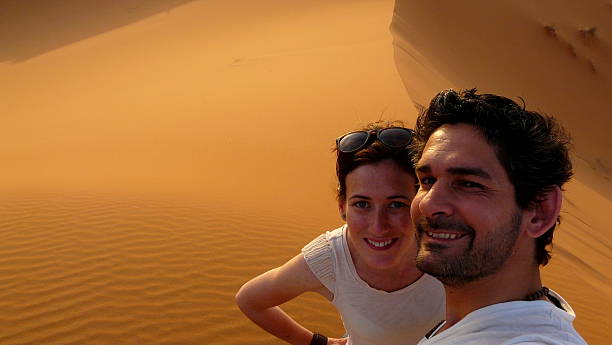istock Young couple taking a self picture in the desert 486956716