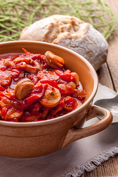 istock Lecho - stew with peppers, onions and sausages. 486957640