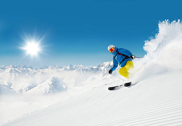 istock Man skier running downhill 486963438