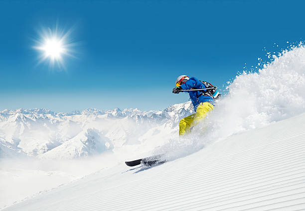 istock Man skier running downhill 486963476