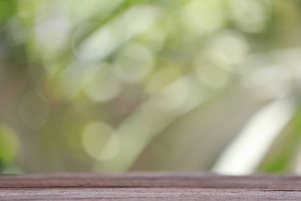 istock wood floor and colorful bokeh. 486963732